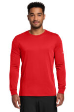 Nike Dri-FIT Cotton/Poly Long Sleeve Tee. NKBQ5230 University Red