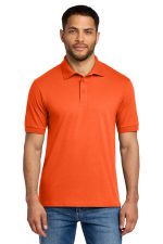 Port & Co Core Blend Jersey Knit Polo. KP55 Safety Orange