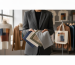 Person holds various — fabric selection custom apparel sustainable